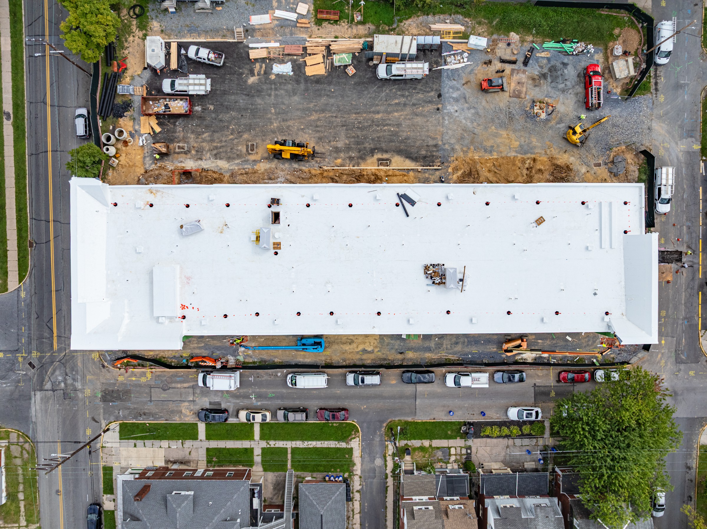 Overhead view of the Woodward Lofts roof covering on September 9, 2026
